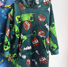 Fleece Hooded Oversized Blanket For Boys Featuring A Vibrant Yellow Porous Character and Video Game Print  With Front Pocket And Long Sleeves