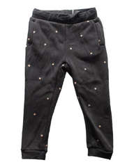Black track pants with white spots