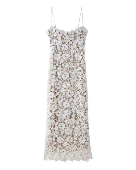 Cream coloured dress adorned with Flowers
