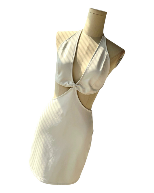 White Halter Neck Dress with Side Cut-Outs and a Low Neck Line
