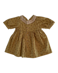 mustard yellow dress with polka dots and collar rim
